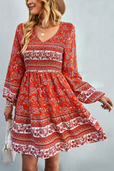 Robe bohème à col en V et manches ballon